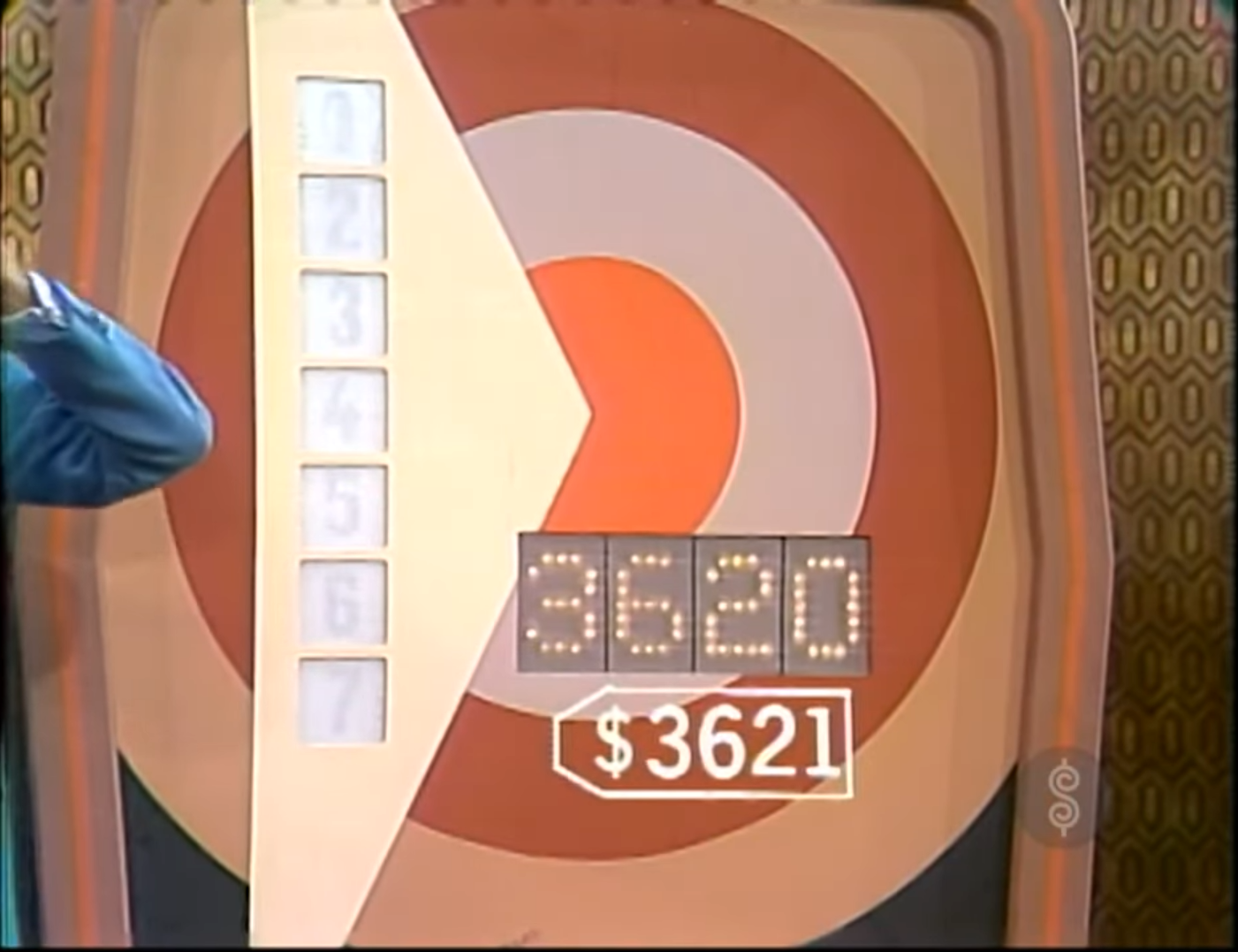 A game show set displaying a large bullseye target with numbers on the left side, and the number 21 prominently shown below the target. The contestant has lost the game Bullseye 1972 by just one dollar! The worst loss in Price is Right history!