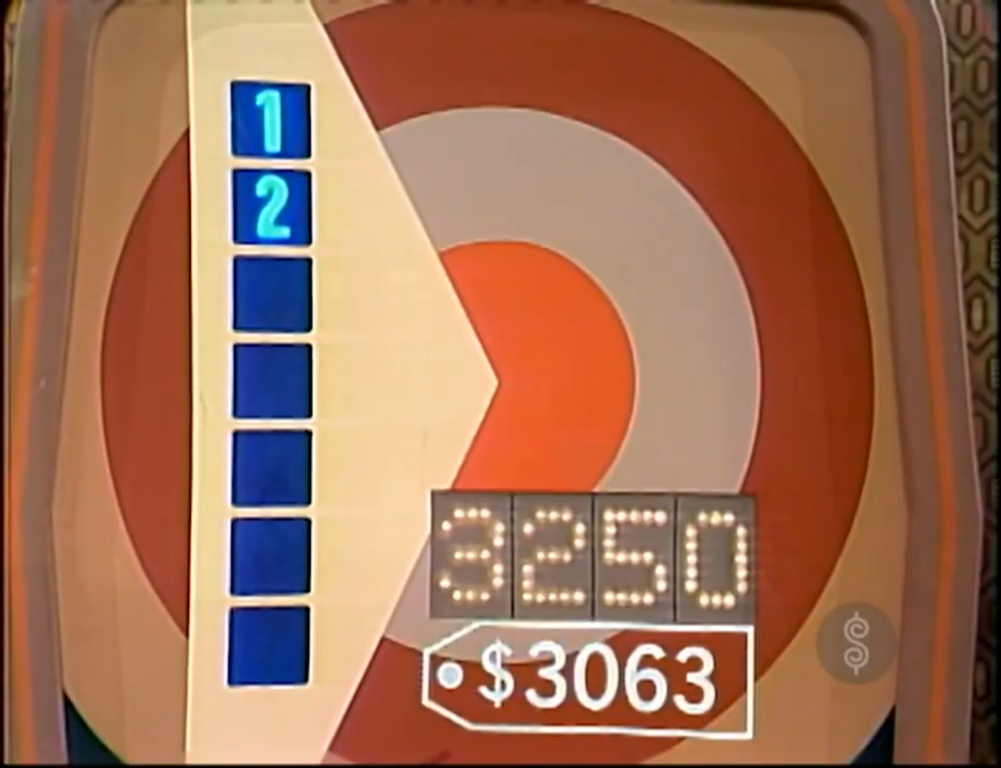 Game board for the Bullseye pricing game featuring a circular target and displays for bids, showing '3250' and '63'.