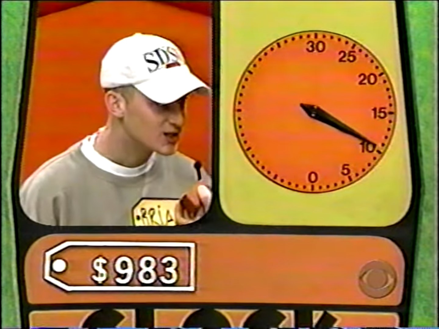 Contestant making a price guess in the Clock Game on The Price is Right, with a timer indicating time left.