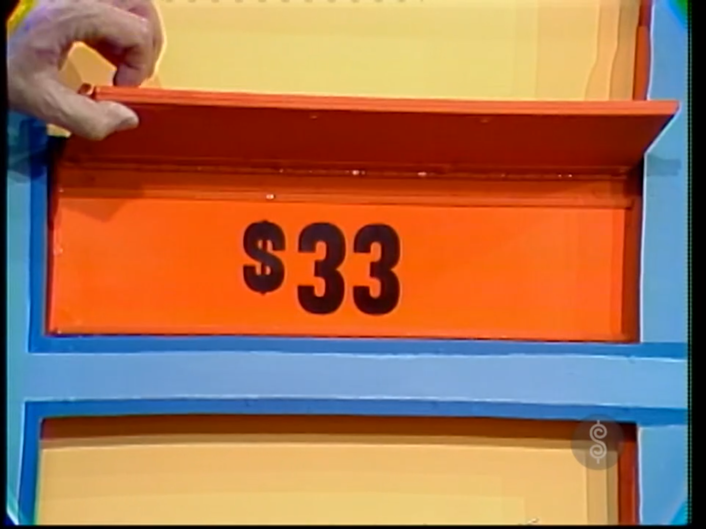  displayed on a bright orange panel during a game segment.