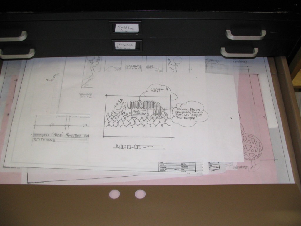 Blueprints with sketches for a game show set design, featuring seating arrangements labeled 'AUDIENCE' and notes about props.