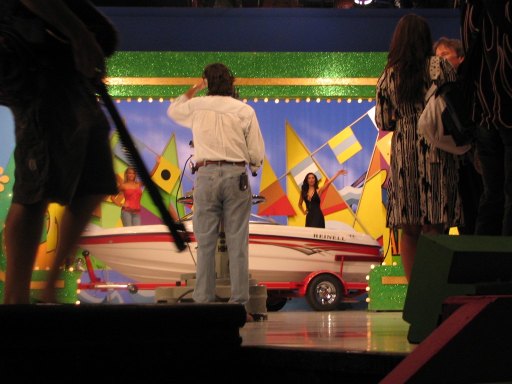 A behind-the-scenes photo from the premiere week of Season 35 of TPiR, featuring a boat on stage and cast members preparing for the taping.