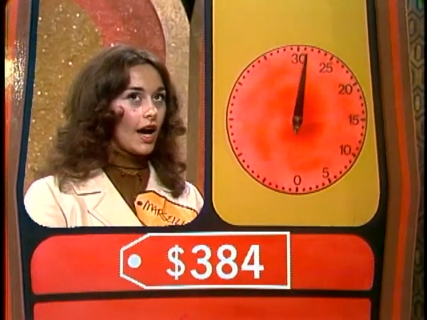 Contestant Marcella with a surprised expression, beside a large countdown clock displaying 30 seconds and the price tag reading 4.