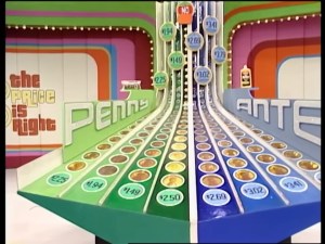 A colorful 'Penny Ante' game display from The Price is Right featuring two main sections labeled 'Penny' and 'Ante', with numbered coin slots and a large 'NO' sign in the center.