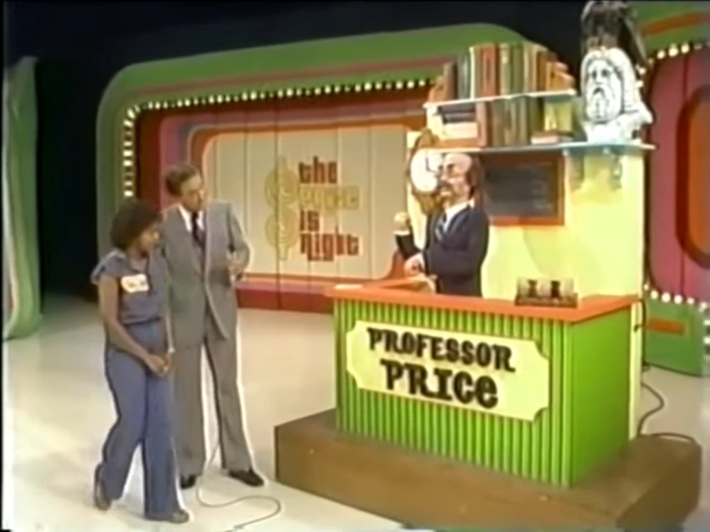 A scene from 'The Price is Right' featuring Bob Barker and a contestant at the game show set, with a display labeled 'Professor Price'.