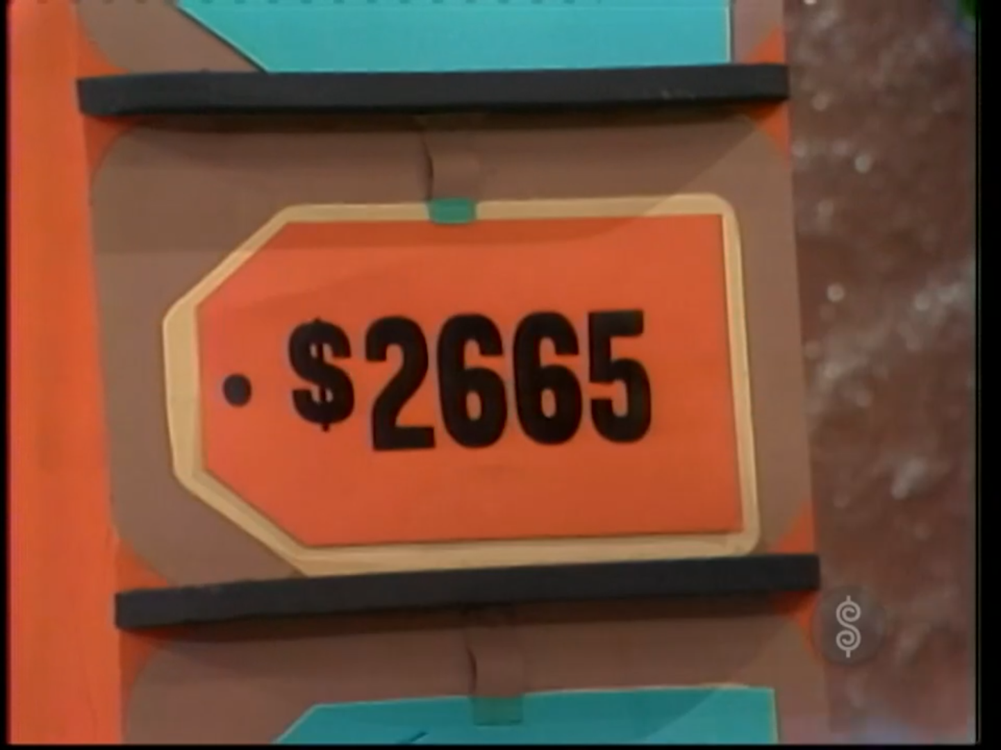 A winning 65 price tag displayed during the 'Five Price Tags' segment.
