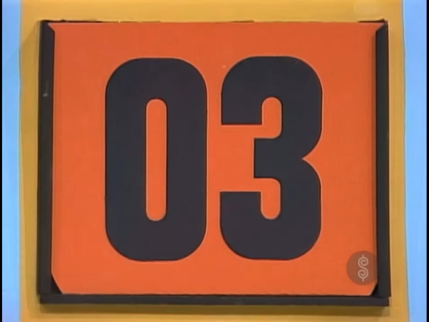 A large display showing the number '03' on an orange background with a black outline.