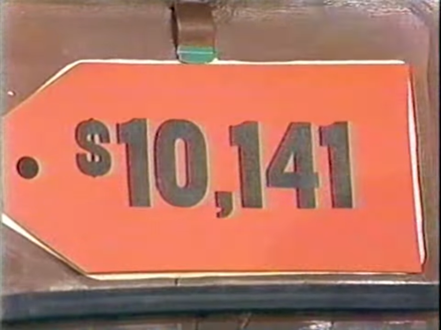 ,141 price tag for a prize in the Five Price Tags game.