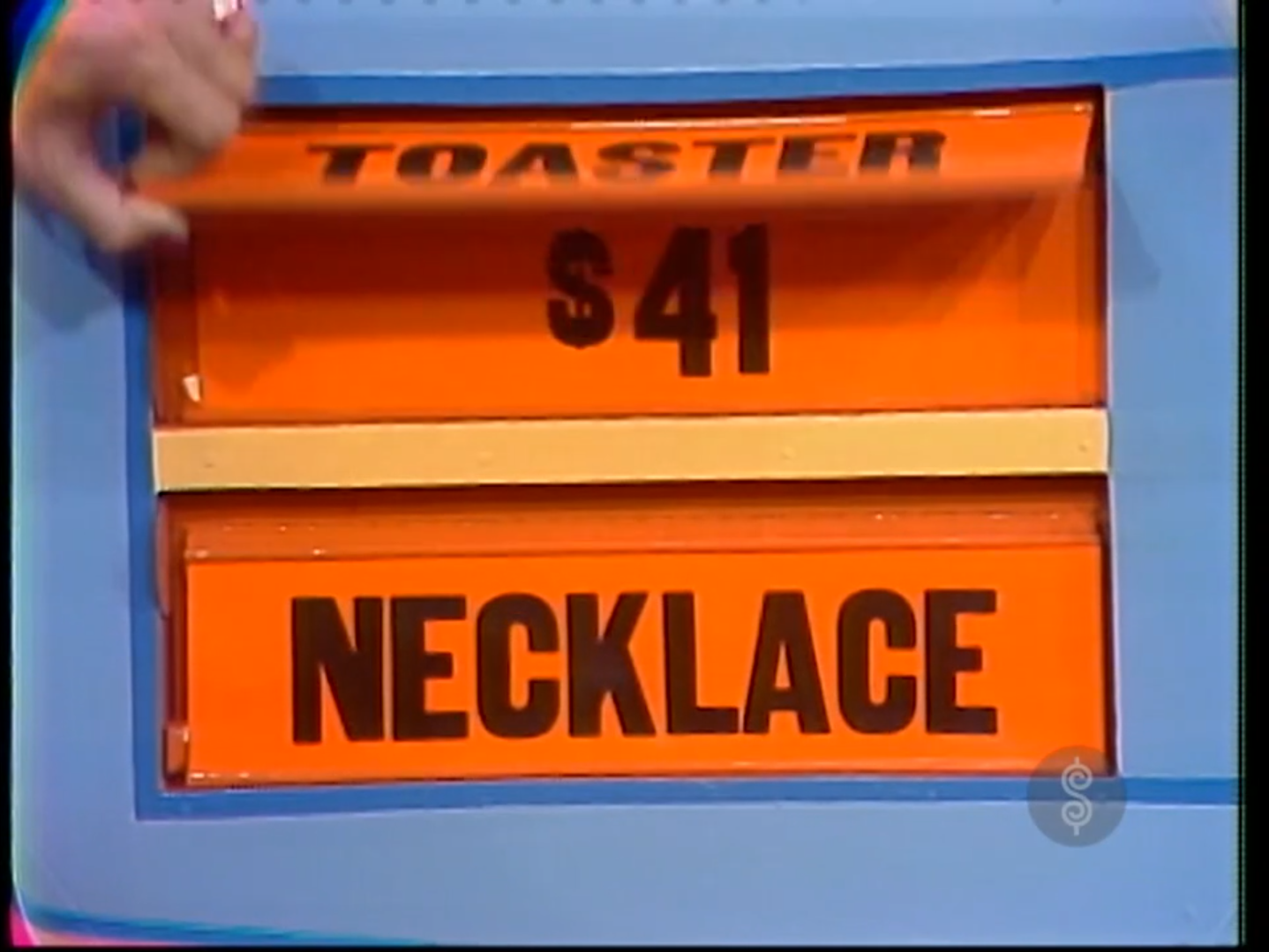 Game board showing the prizes 'Toaster' priced at  and 'Necklace' in the game 'Give or Keep' from The Price is Right.