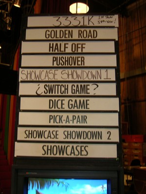 A board featuring game names and their order for a game show, including titles like 'Golden Road,' 'Half Off,' and 'Showcase Showdown 1.'