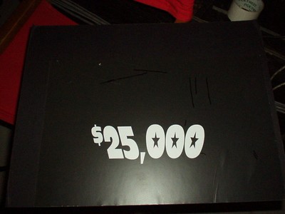 $25,000 prize box with a black background and white text featuring stars.