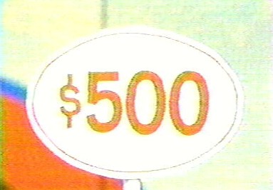 $500 price tag in Hole in One from the early 70s displayed in a bright oval sign.