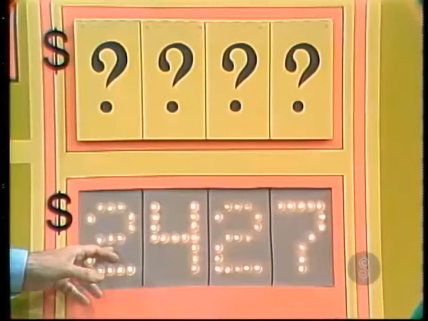 A game board displaying the number '2427' with four question marks above, representing the price of a car in The Price is Right game Double Digits.