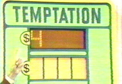 Image of a game board displaying the word 'TEMPTATION' with dollar amounts visible, associated with classic television game show The Price is Right.