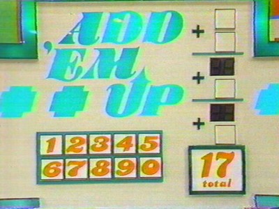 Game display board from 'The Price is Right' showing the title 'ADD 'EM UP' with numbers 1 to 9 and a total of 17.