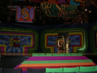 A vibrant view of the stage set from 'The Price Is Right,' featuring colorful designs and the show's logo in the background.