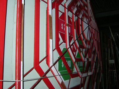 Close-up view of a colorful wall featuring price tags and red geometric patterns from the pricing games at CBS Television City.