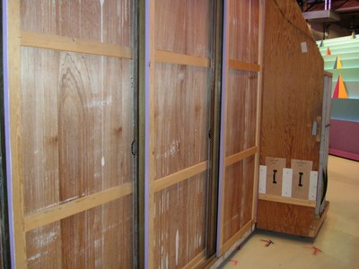 The rear of Lucky Seven, appearing as wooden panels and a smooth floor.