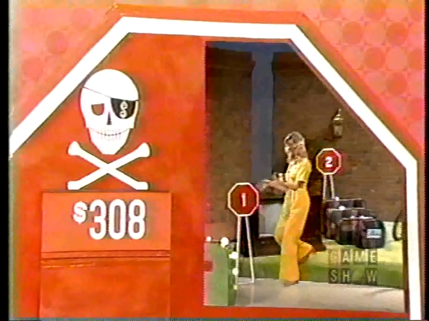 A game show contestant walks in front of a vibrant red board displaying the Danger Price of 8, accompanied by a pirate-themed skull and crossbones graphic.