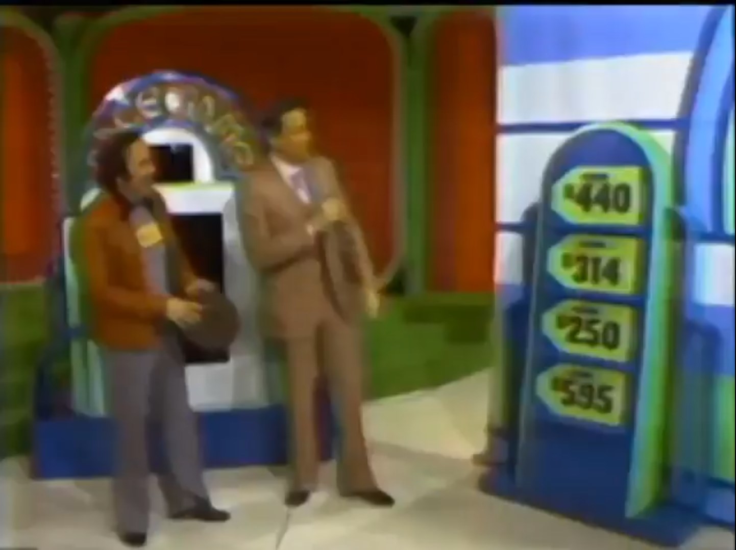 A playing of Race Game from a 1978 episode of The Price is Right, with a contestant taking his hat off.