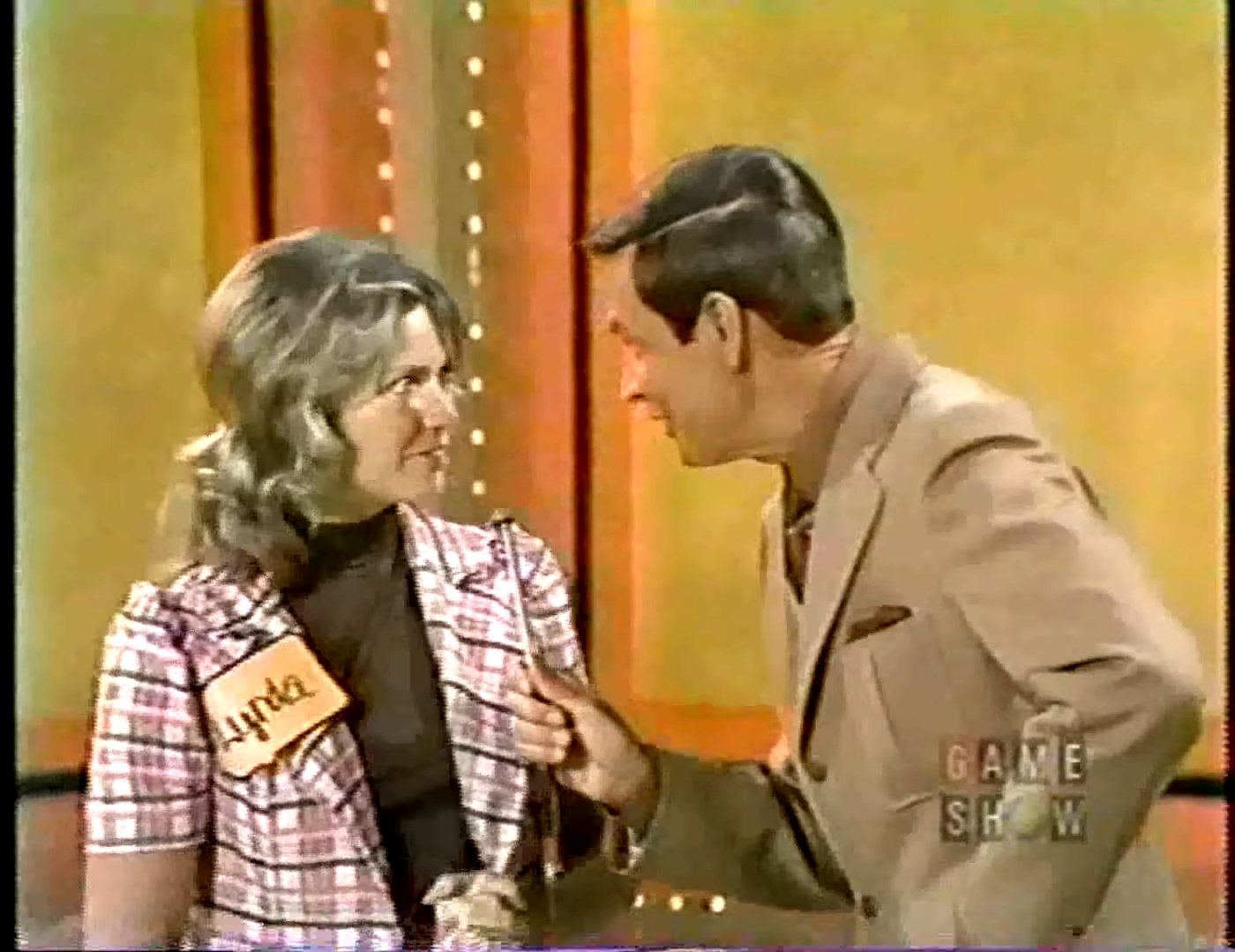 Contestant Lynda interacting with Bob Barker on stage during a 1973 taping of The Price is Right.