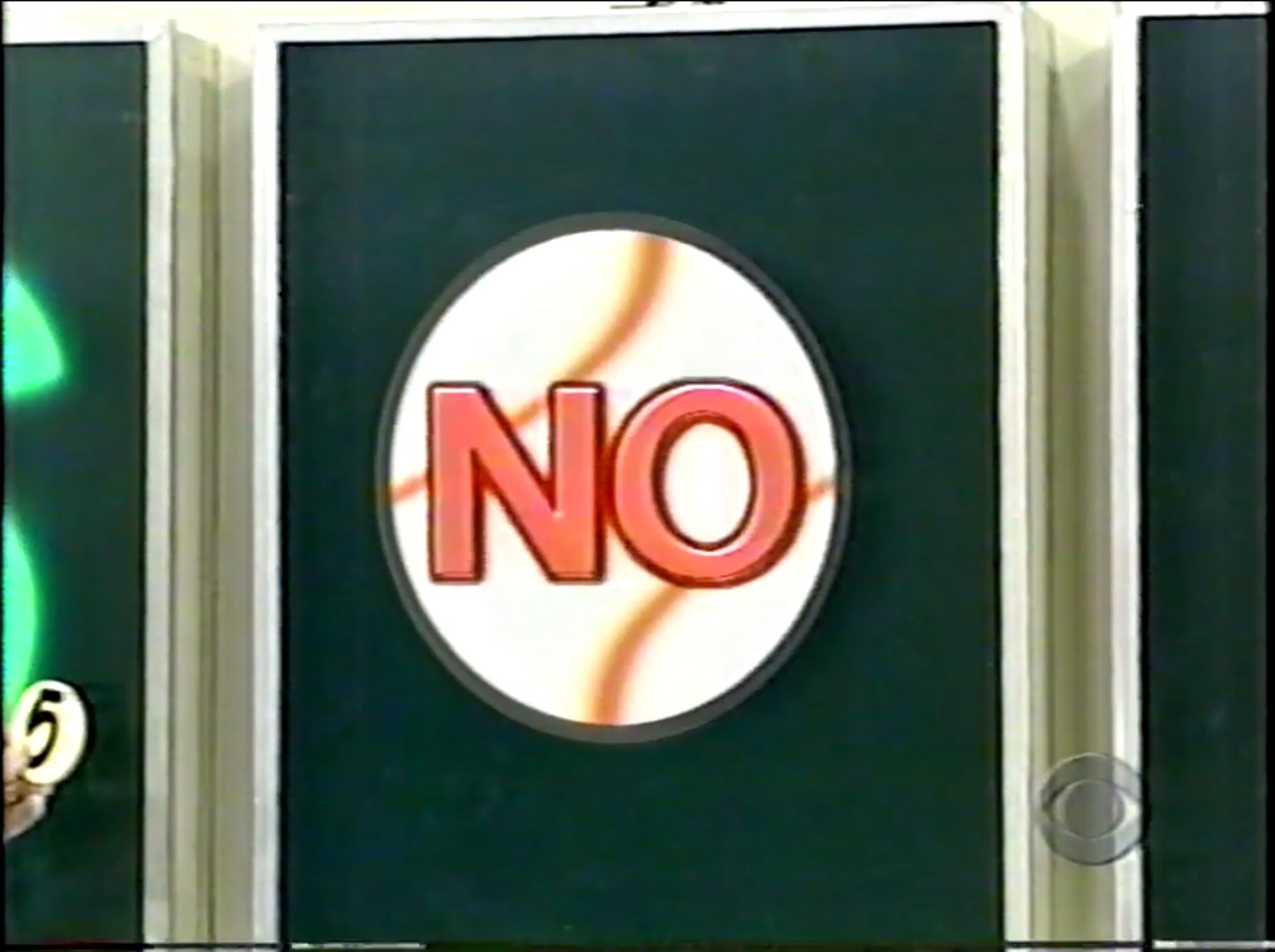 A large green sign labeled 'NO' with a baseball graphic, indicating an incorrect guess in the game 'Three Strikes'.