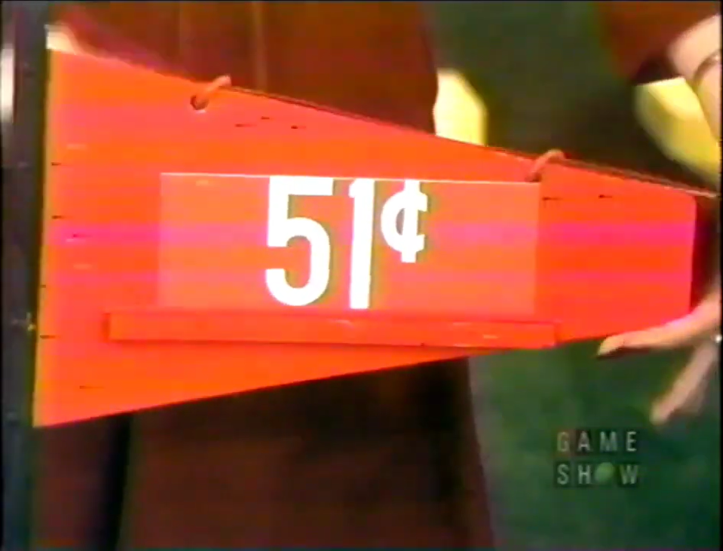 A red triangular sign displaying the price of 51 cents, used in the game Hole in One.