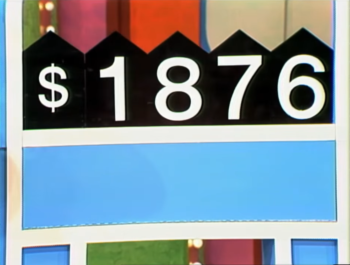 76 displayed on a game board for the Squeeze Play game, showing the dollar sign and three digits.