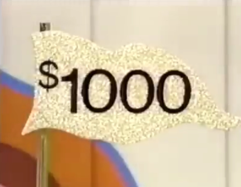 A $1000 flag in Hole in One used on primetime specials in 1986.
