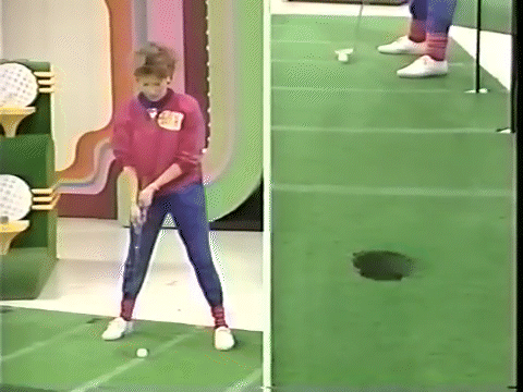 A putt bounces off the back of the cup and bounces off the back of the green and into the hole.