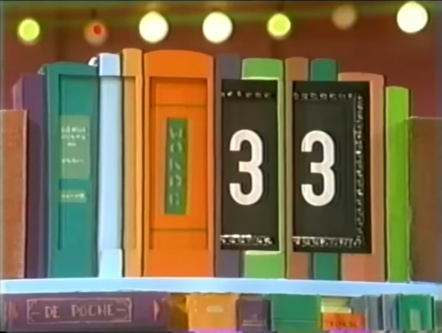 A colorful display of books with the numbers '3' prominently featured on two black book spines, set against a brightly lit background.