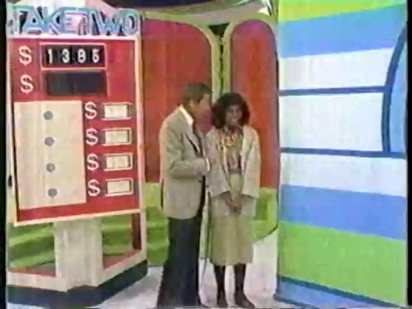 A contestant stands beside the game board for 'Take Two', featuring the target price of 85 displayed prominently.