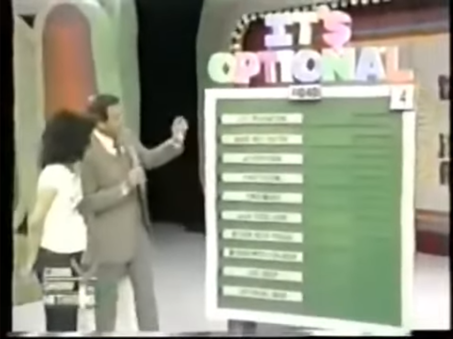 A contestant and host present the options board for 'It's Optional' game on The Price is Right, showcasing various car features and prices.