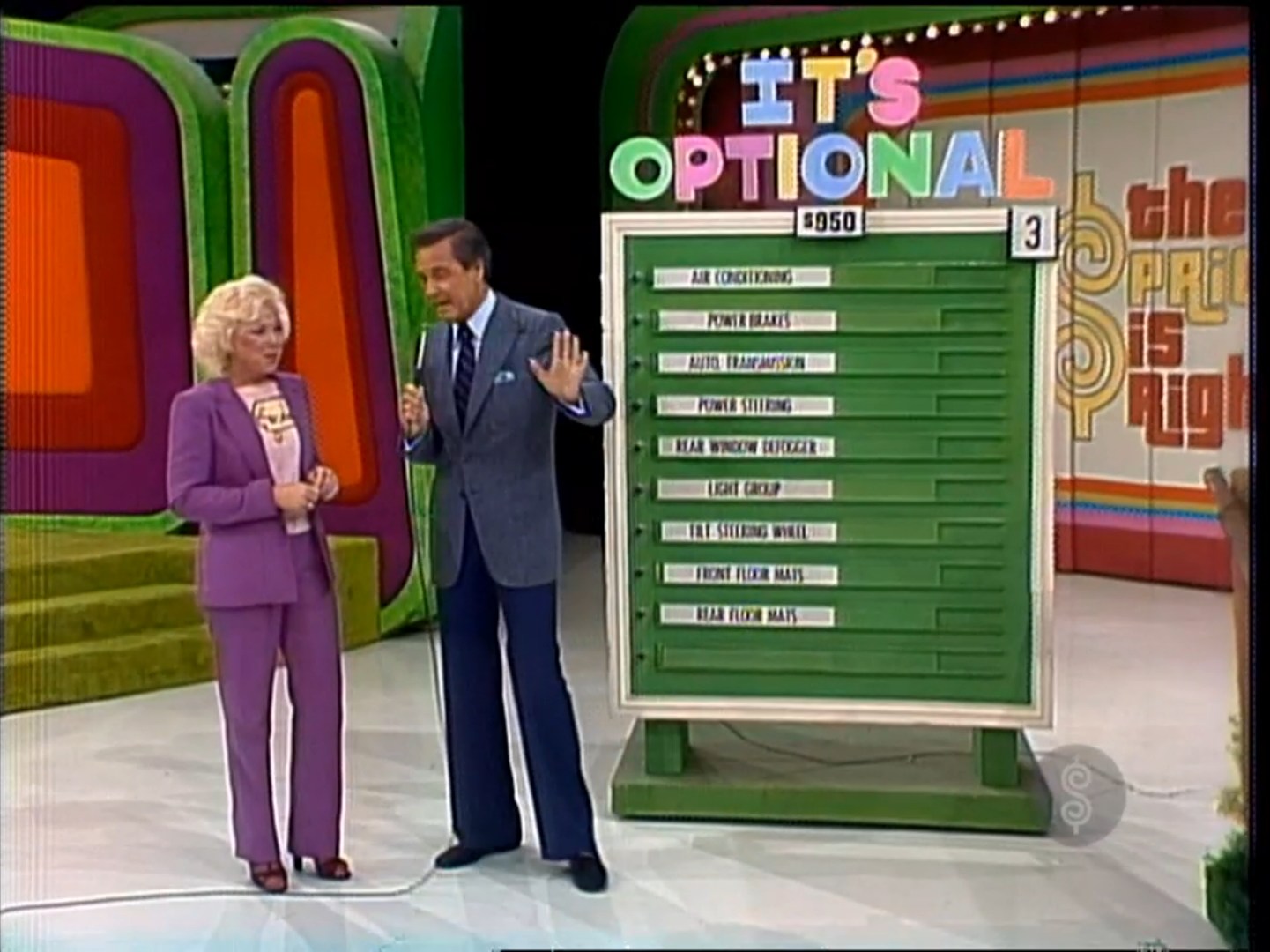 A contestant and host present the game 'It's Optional' on The Price is Right, with a green options board listing car features.