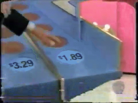 A game show contestant reveals two prices on the Penny Ante game board, highlighting a price tag of .89.
