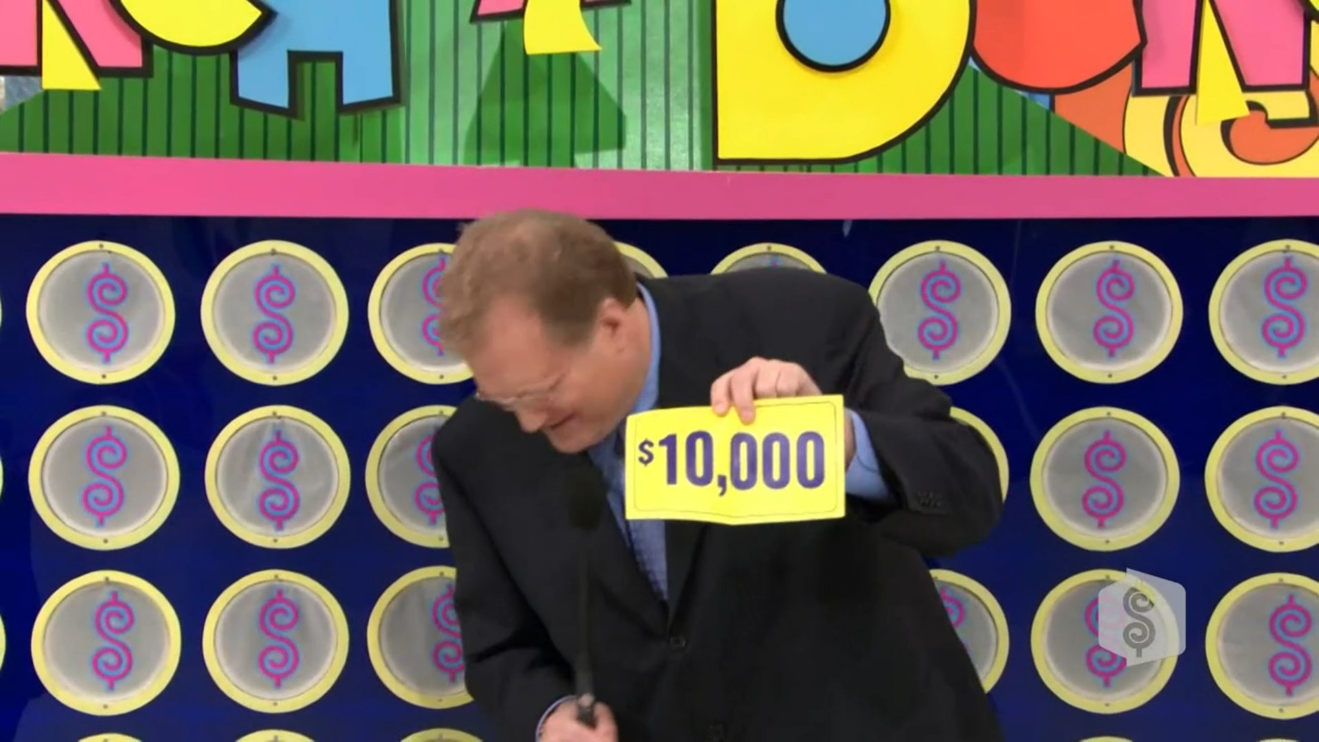,000 cash prize displayed by a game show host during the Punch a Bunch game.