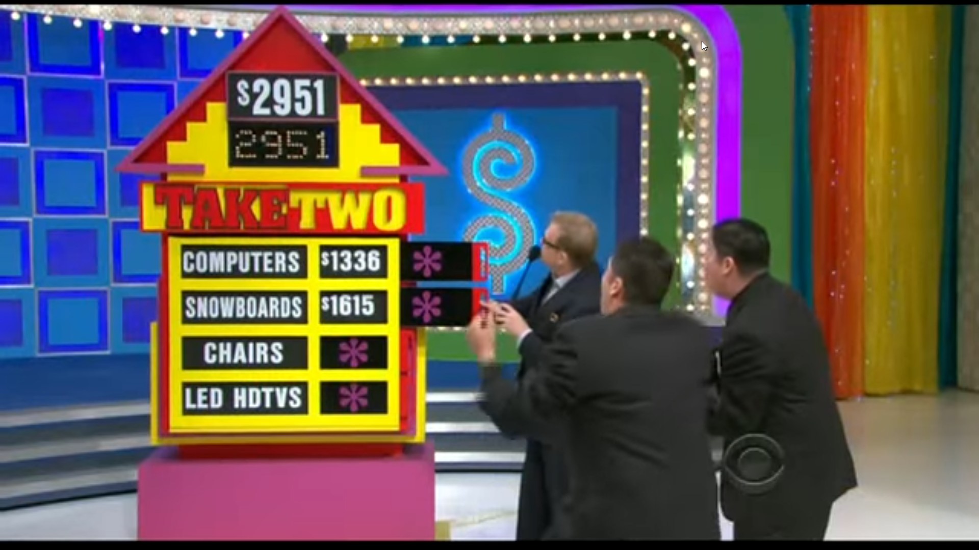 A colorful game display for the Take Two segment on The Price is Right, featuring a pricing game setup with the target price of 51 and the options of computers, snowboards, chairs, and LED HDTVs.