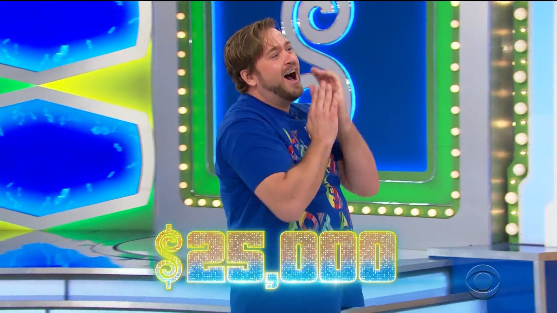 A contestant celebrates having won $25,000 on The Price is Right playing Punch a Bunch/