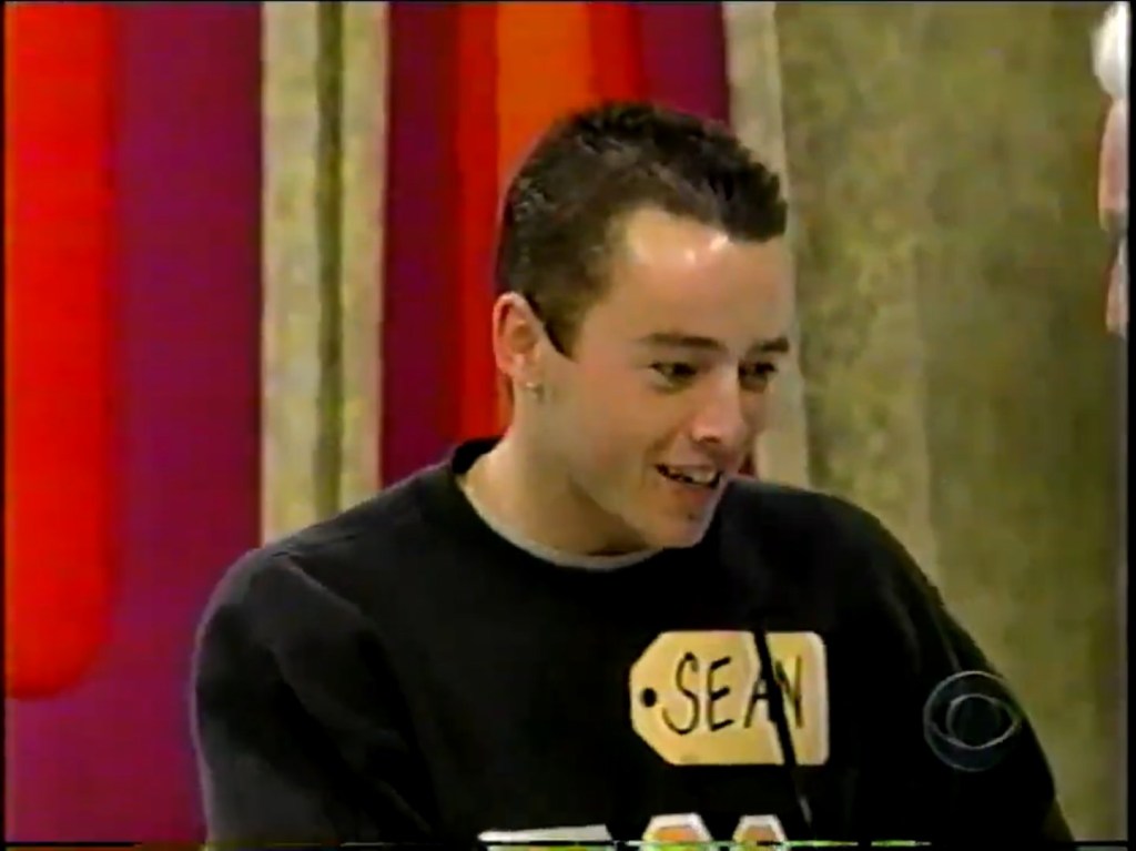 A young contestant named Sean smiling and interacting during a game on The Price is Right.