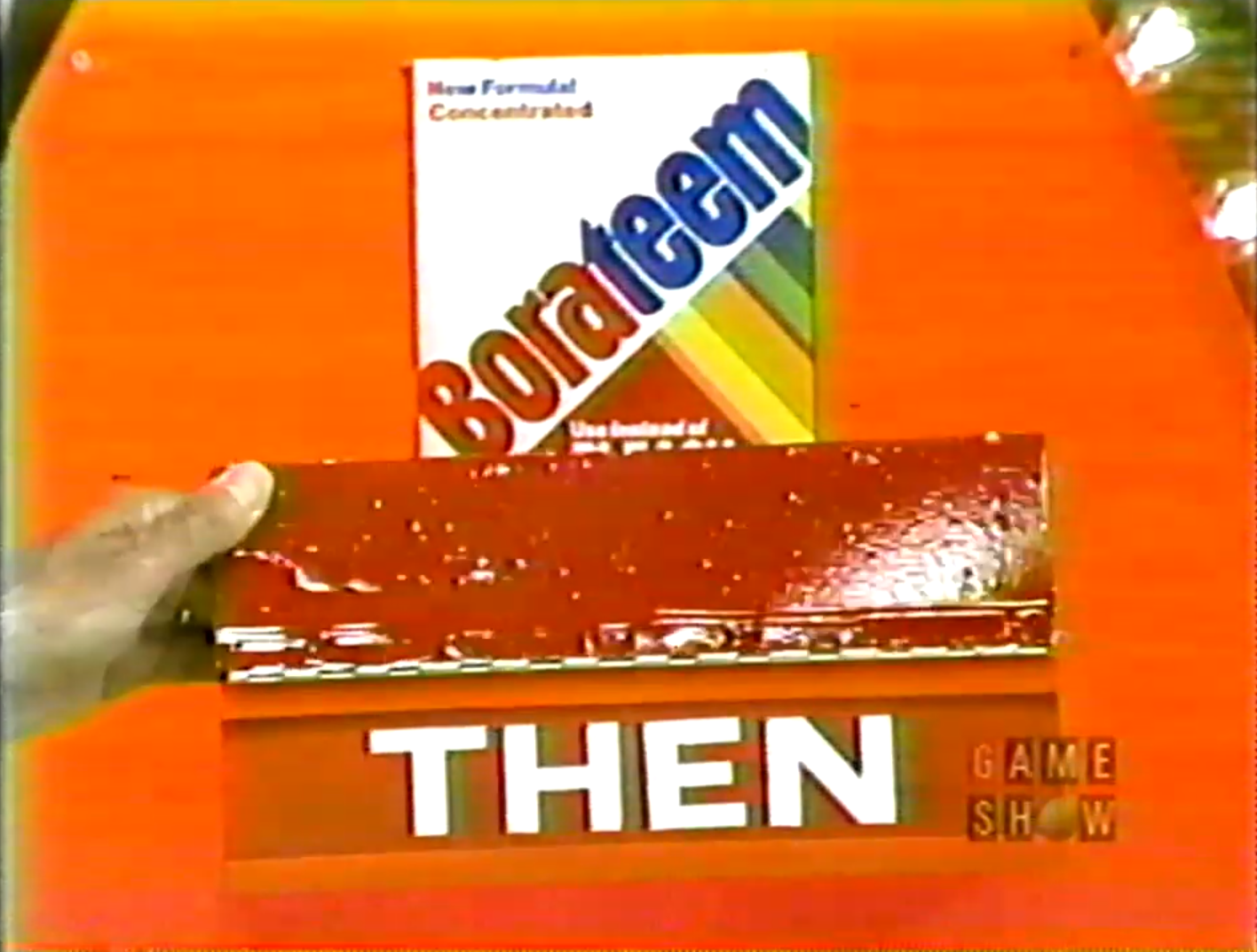 A close-up of a hand holding a red 'THEN' sign next to a box of Borateem laundry detergent, set against an orange background.