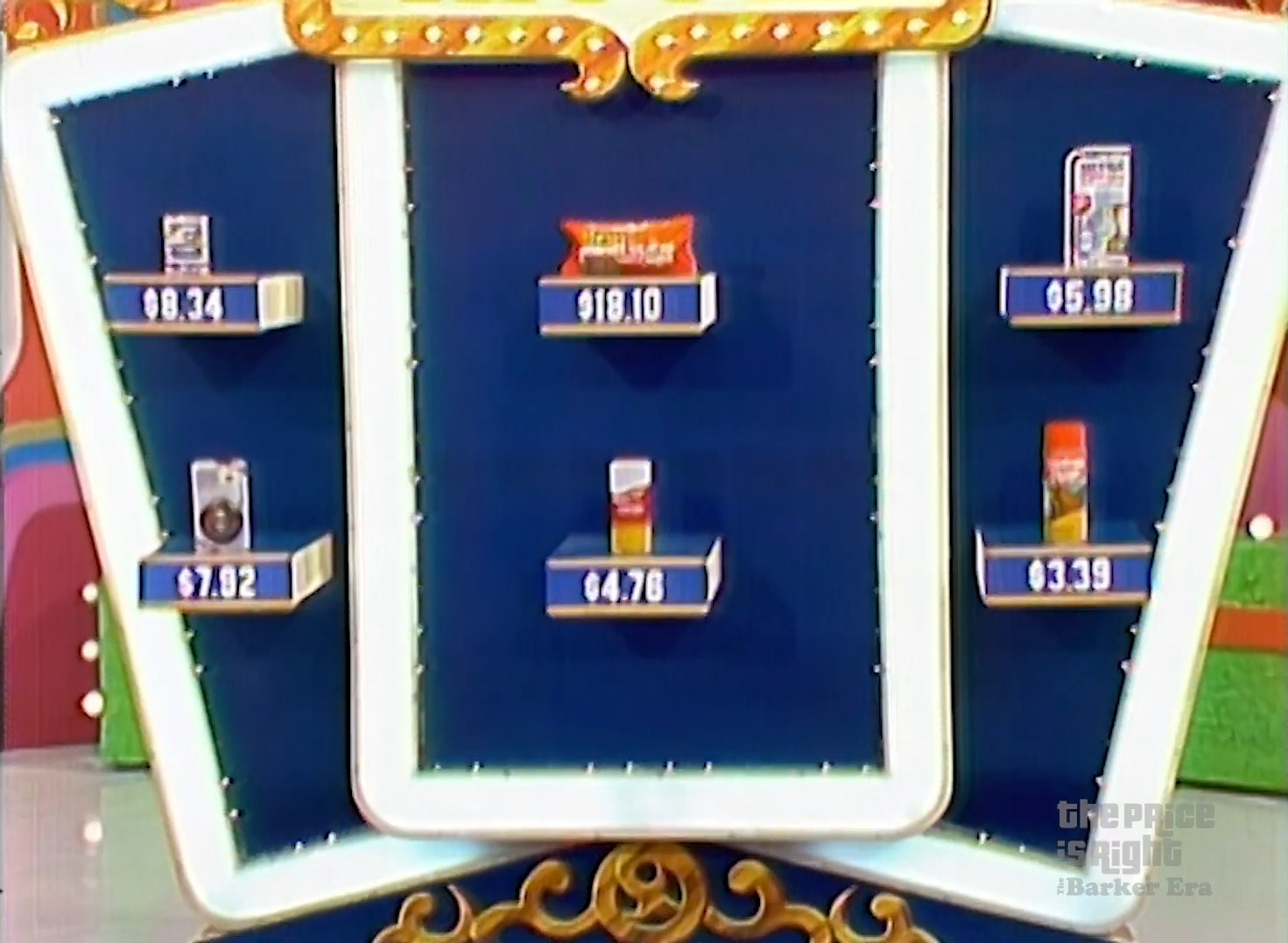 A display featuring six grocery products with their prices listed, used in the game 'Hit Me' from The Price is Right.