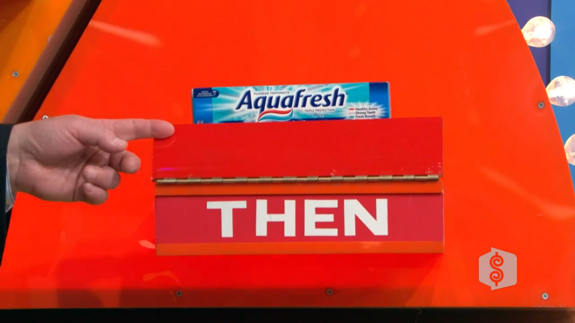 A hand points to a red box labeled 'THEN' with a tube of Aquafresh toothpaste displayed above it, set against an orange background.