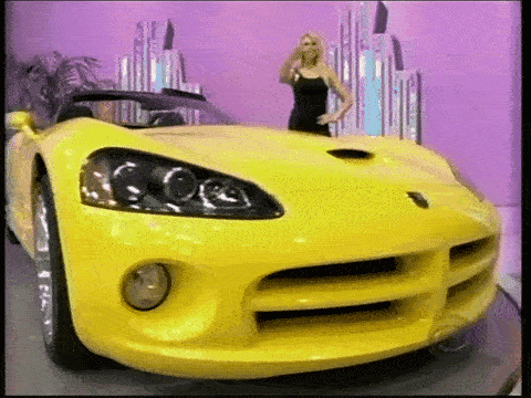 A yellow Dodge Viper offered on a turntable in Golden Road, the largest pricing game on The Price is Right