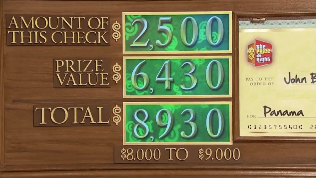 Scoreboard displaying the amount of the check as ,500, the prize value as ,430, and the total as ,930, with winning range between ,000 and ,000.