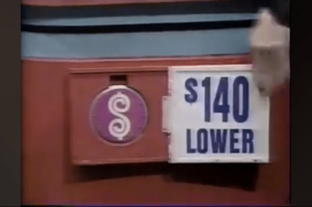 0 lower price indicator shown during a game on The Price is Right, with a dollar sign symbol.