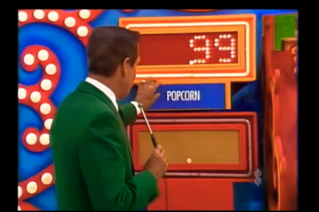 Bob Barker reveals the price of popcorn, which is 99 cents, during 'Pick a Pair' on The Price is Right.