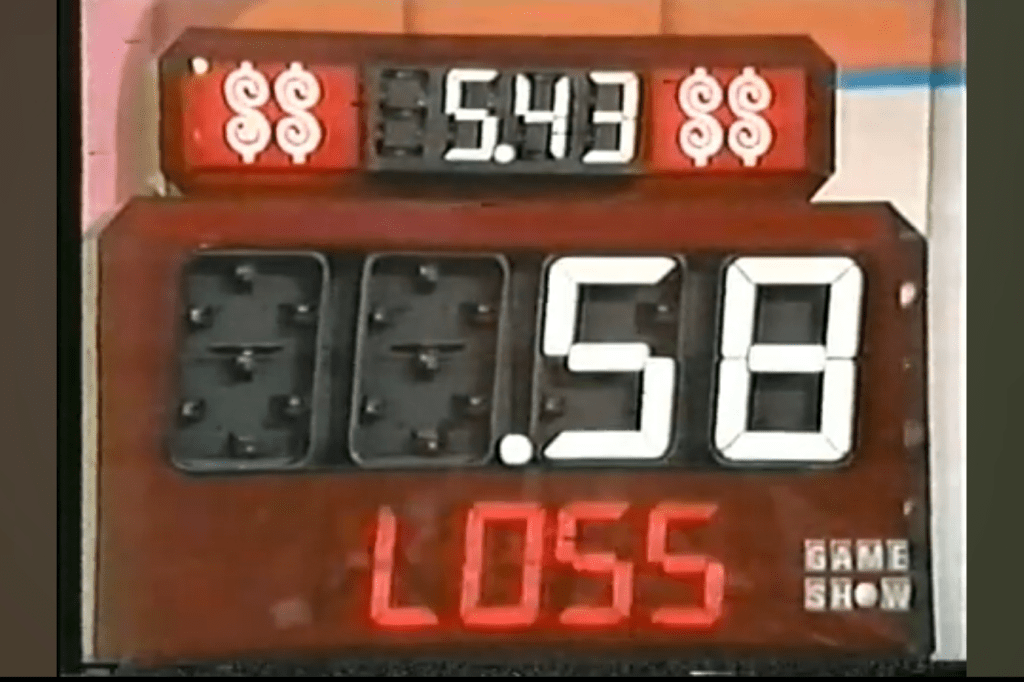 Scoreboard displaying the contestant's total of .43 and a loss of 58 cents in a game show setting.