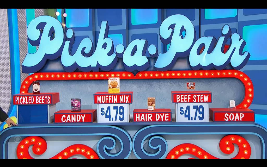 Game board for Pick-a-Pair featuring grocery items: Pickled Beets, Candy, Muffin Mix, Hair Dye, Beef Stew, and Soap, with prices displayed for matching.