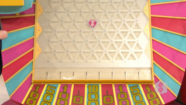 A contestant yelling in anger after his lone Plinko chip hits 0, with host Drew Carey trying not to laugh.