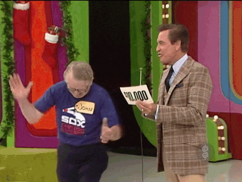 A contestant begins dancing a jig after winning ,000 playing a Christmas-themed game of Punch a Bunch on The Price is Right.